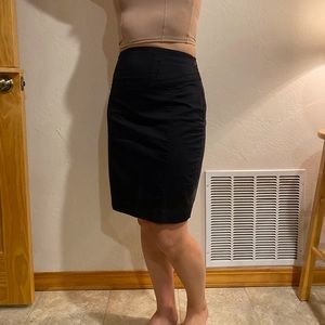 Express black pencil skirt size 4. Back slit.